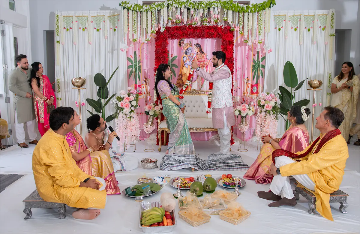 Rituals in the mandap, family gathered close