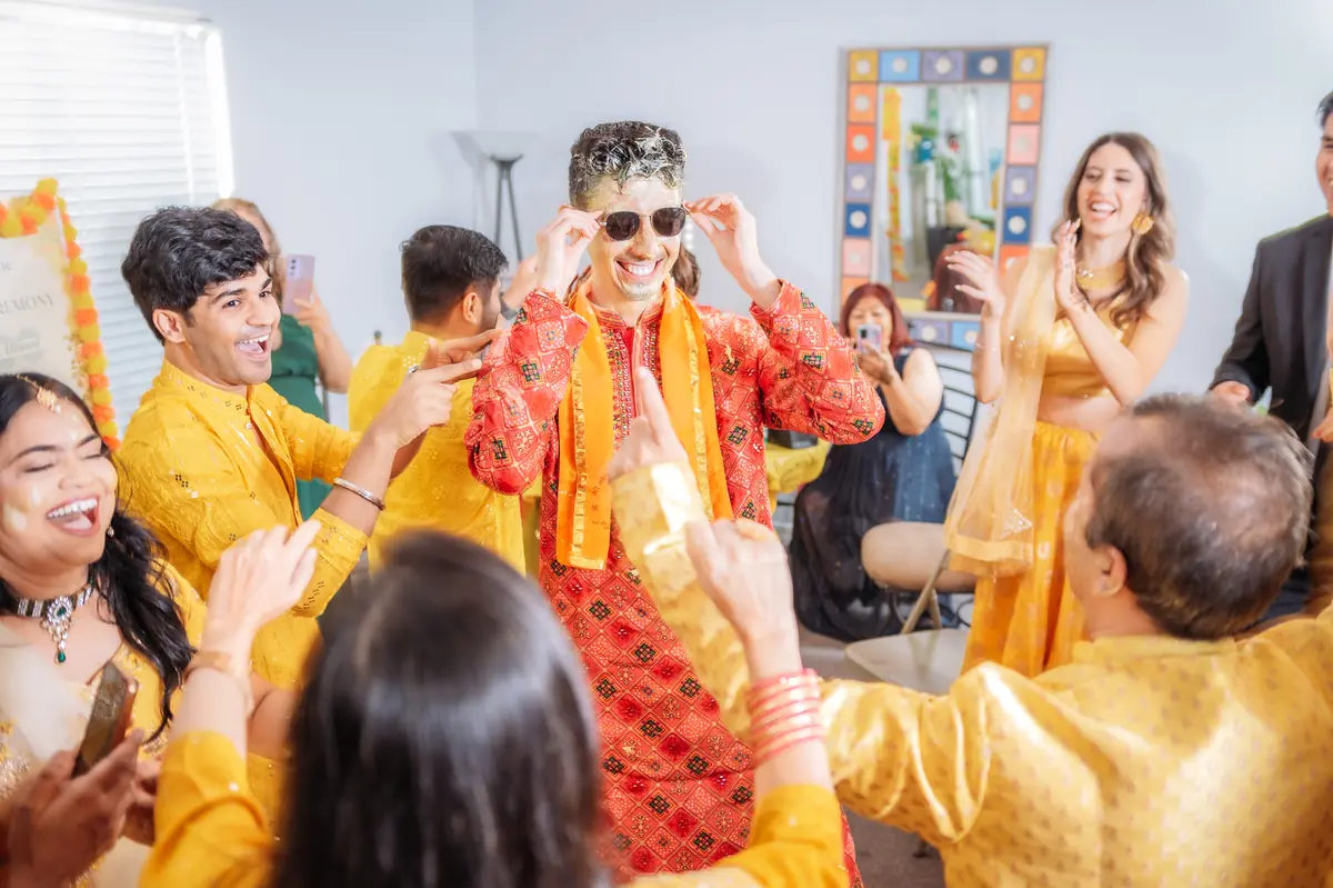 The groom celebrated by friends at his haldi