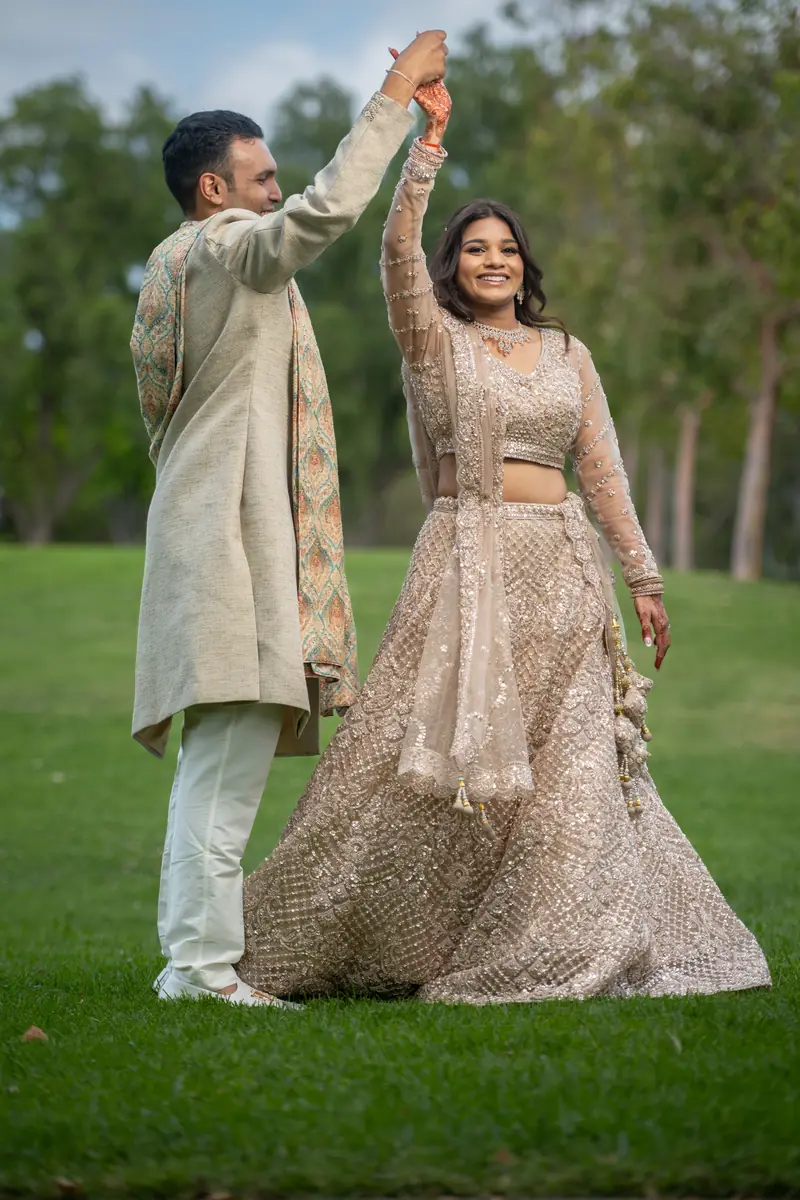 A twirl on the lawn in champagne and gold
