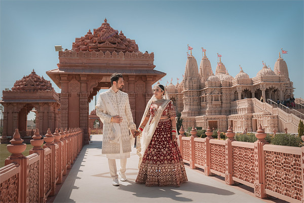 The couple with the whole temple behind them