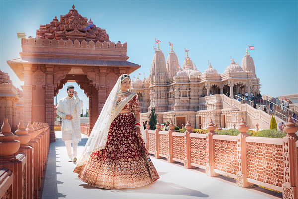 The bride turning, spires behind