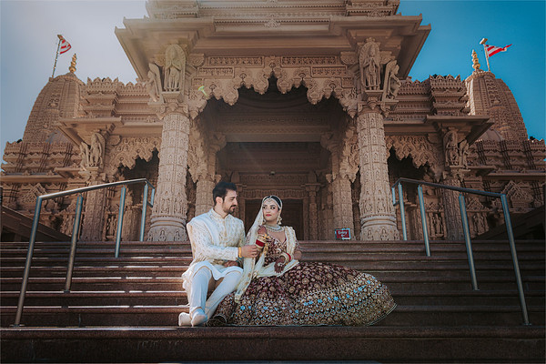 Seated together on the temple steps