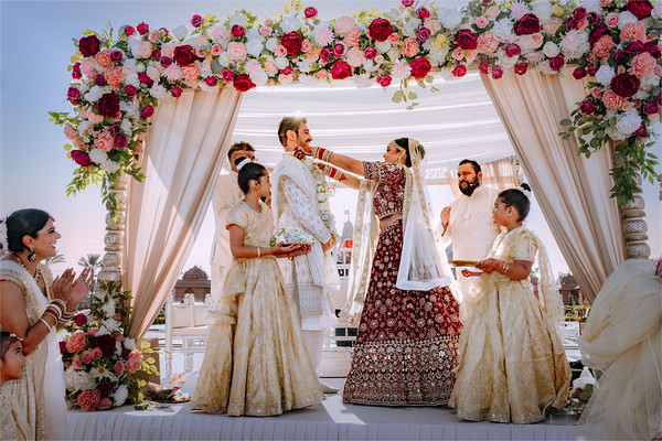 Under the mandap, the ritual underway
