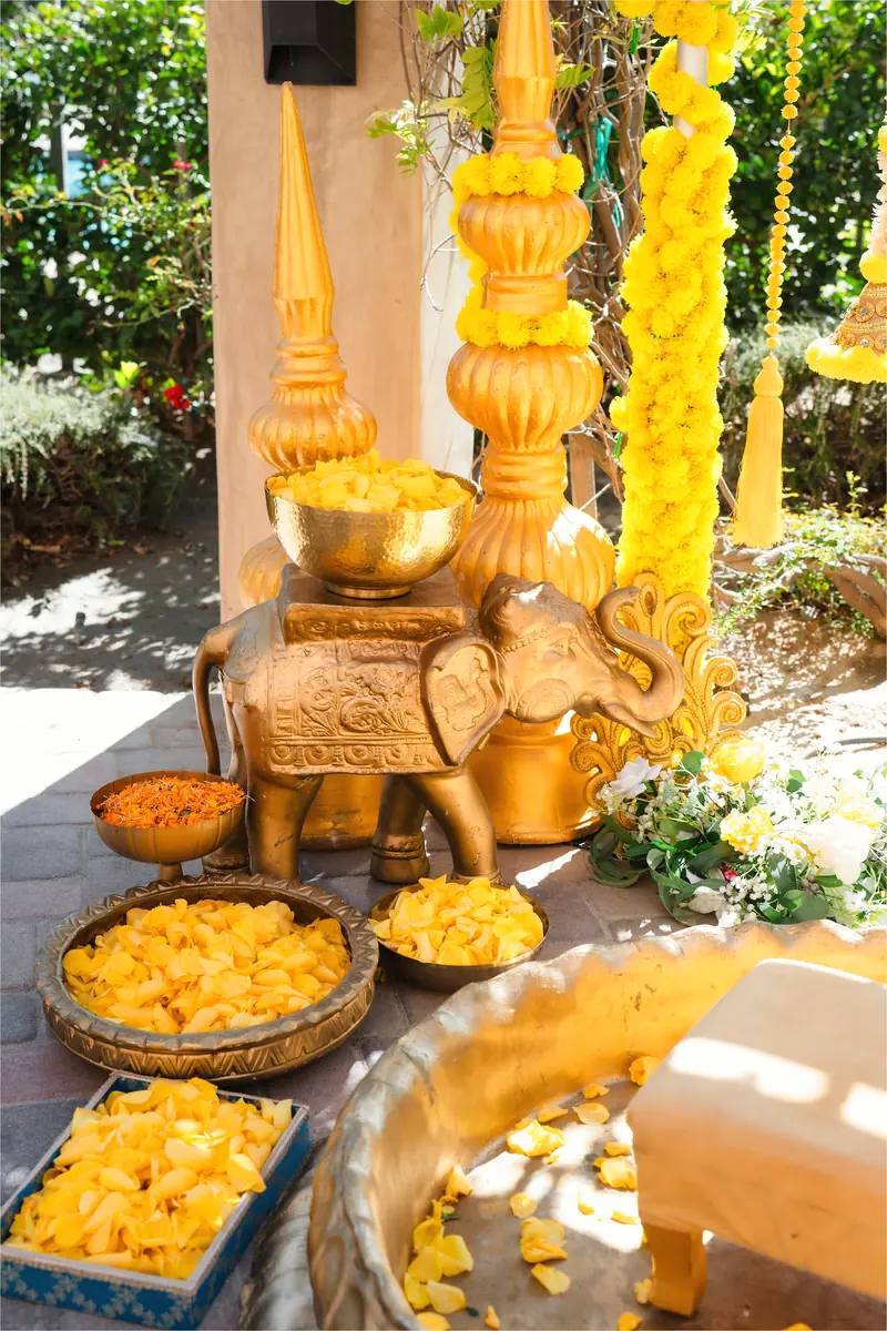 The haldi table, marigolds and turmeric