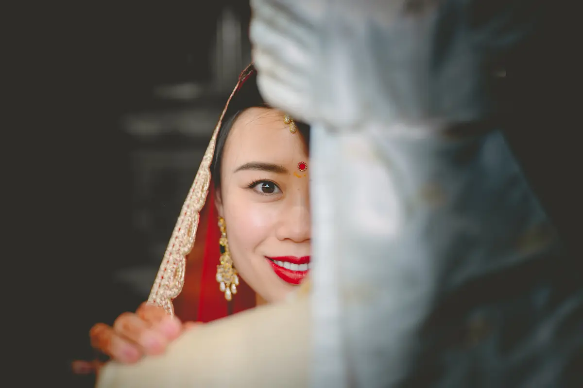 The bride, framed in her veil