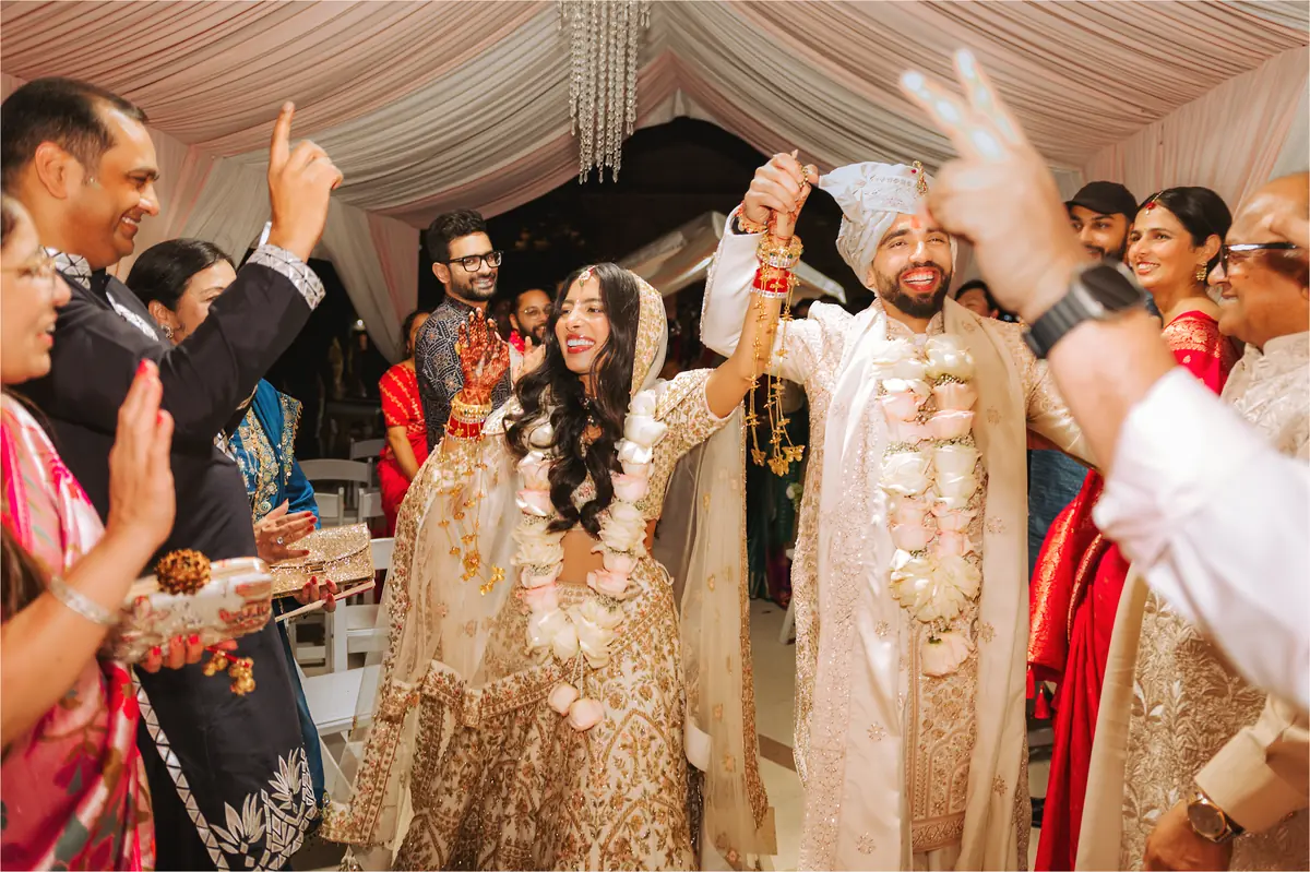 Family raise the garlands