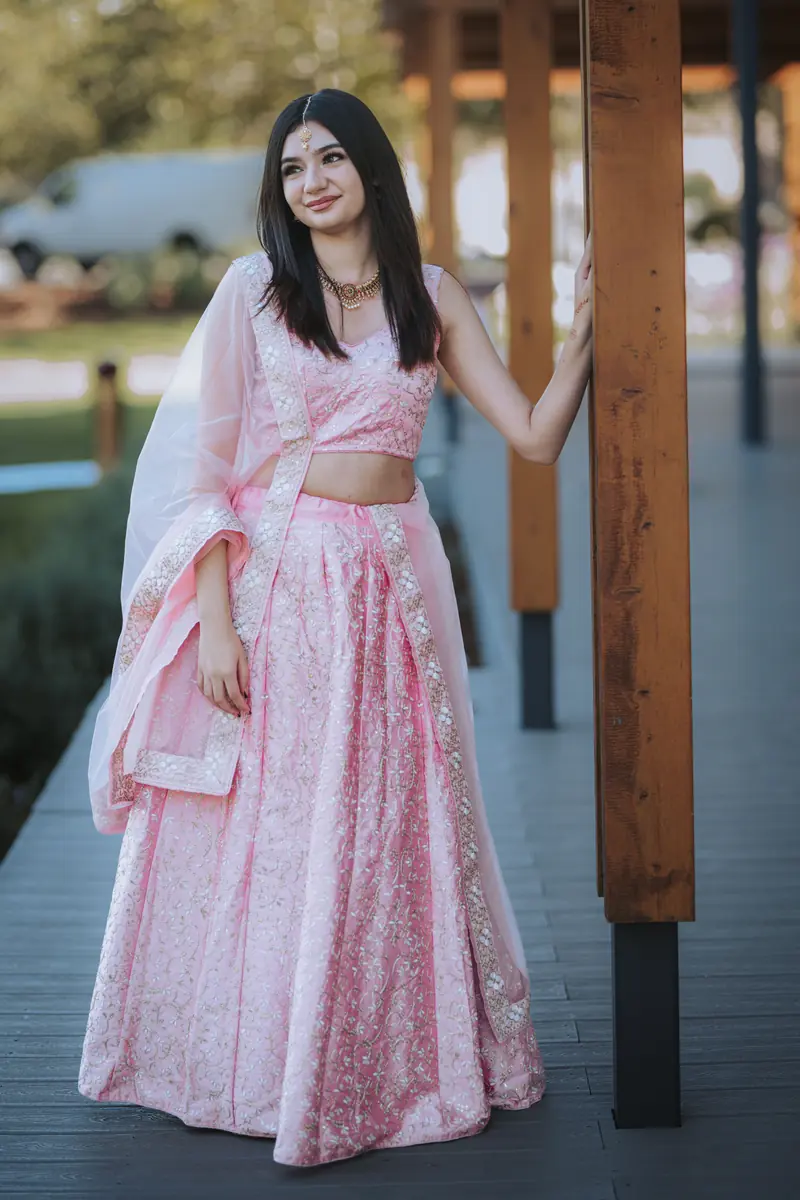 Blush silk against the dark rail