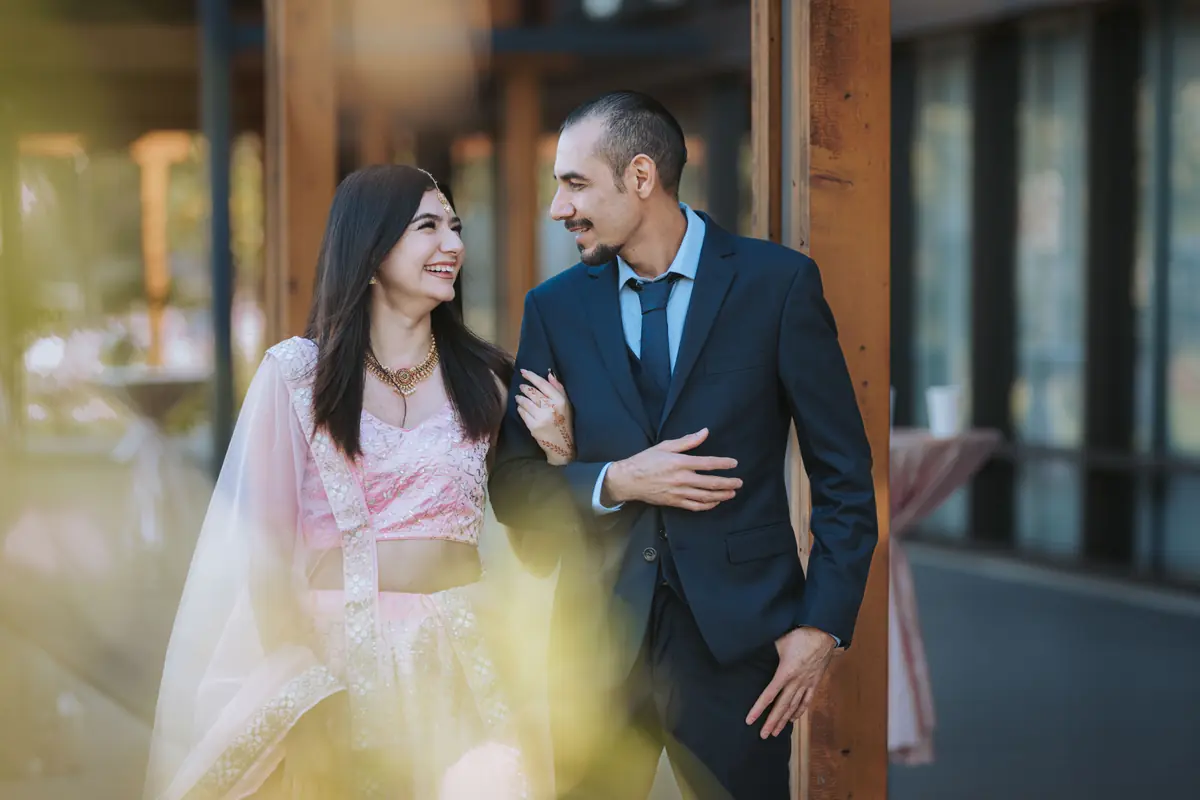 A couple laughing in the light