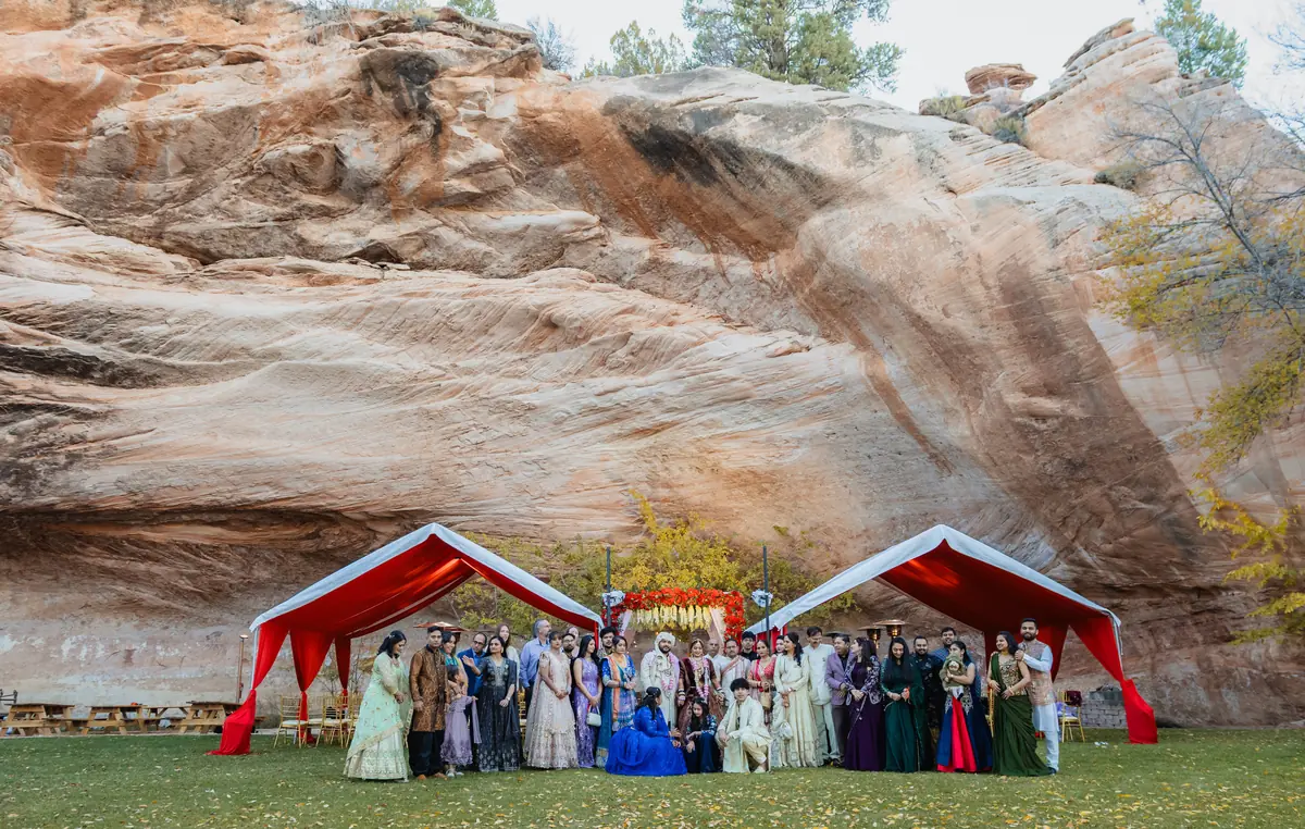 The gathering beneath the cliff