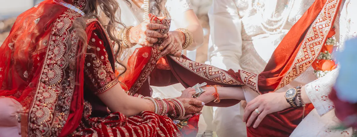 Hands joined in ceremony ritual